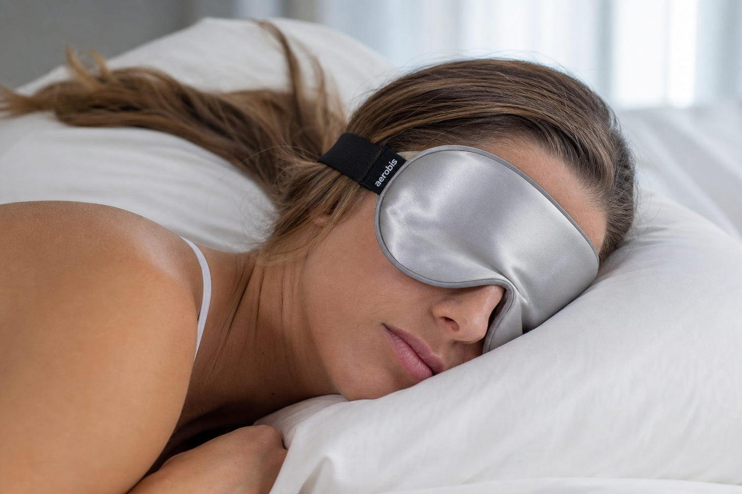 athlete sleeping in the aerobis Sleep Mask (AI)